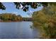 Scenic view of the lake surrounded by lush trees, offering natural beauty and tranquility at 3519 Sunderland Ne Way, Brookhaven, GA 30319