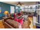 Cozy living room featuring leather sofas and wood floors at 3519 Sunderland Ne Way, Brookhaven, GA 30319
