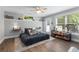 Well-lit bedroom with modern decor and large windows at 12815 Oak Falls Dr, Alpharetta, GA 30009