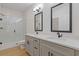 Bathroom featuring double vanity, shower, updated faucets and new fixtures at 1488 Campbell Rd, Covington, GA 30014