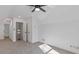 Bedroom features neutral carpet, white walls, ceiling fan, storage and recessed lighting at 1488 Campbell Rd, Covington, GA 30014
