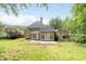 Expansive backyard with a well-maintained lawn and exterior view of the home at 1593 Brynwood Nw Ct, Acworth, GA 30101