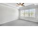 Bedroom with natural light, ceiling fan and tray ceiling at 464 Village Ln, Fairburn, GA 30213