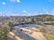 Expansive aerial view of a residential community with a golf course and lake at 170 Elysian Nw Way, Atlanta, GA 30327