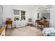 Bright and airy room with white walls, a large window, and antique-style furniture and decor at 170 Elysian Nw Way, Atlanta, GA 30327