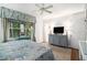 Bedroom featuring a TV, hard wood flooring, and bright neutral colors at 170 Elysian Nw Way, Atlanta, GA 30327