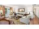 Elegant living room with bright lighting, fireplace and classic furniture, perfect for relaxing at 170 Elysian Nw Way, Atlanta, GA 30327
