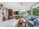 Inviting sunroom with large windows and comfortable seating at 170 Elysian Nw Way, Atlanta, GA 30327