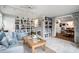 Spacious sunroom with built-in bookshelves and tile flooring at 170 Elysian Nw Way, Atlanta, GA 30327