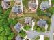 An aerial view of the property showcases its mature landscaping and placement in a tranquil residential neighborhood at 1888 Sever Creek Cir, Lawrenceville, GA 30043