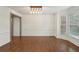 Dining room with hardwood floors, decorative molding, and bay windows with a view at 1888 Sever Creek Cir, Lawrenceville, GA 30043