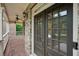 Elegant stone-accented entrance with double doors and a brick porch, creating a grand welcome at 1888 Sever Creek Cir, Lawrenceville, GA 30043