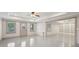 Spacious living area leads to outdoor entry and custom built-in shelves for storage at 1888 Sever Creek Cir, Lawrenceville, GA 30043