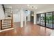 Stylish living space with hardwood floors, access to the deck, and an open floor plan at 1888 Sever Creek Cir, Lawrenceville, GA 30043