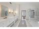 Spacious bathroom featuring dual sinks, modern fixtures, stand up shower and soaking tub at 1888 Sever Creek Cir, Lawrenceville, GA 30043