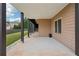 Covered patio with support beams and stairs leading to the upper level at 1888 Sever Creek Cir, Lawrenceville, GA 30043