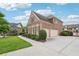 Charming brick home featuring a well-maintained lawn and a convenient two-car garage at 1888 Sever Creek Cir, Lawrenceville, GA 30043
