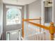 Foyer with a view of the front door, staircase, and a large arched window at 1976 Glen Echo Dr, Decatur, GA 30032
