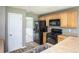 Kitchen featuring stainless sink, range, microwave and refrigerator at 1976 Glen Echo Dr, Decatur, GA 30032
