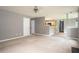 Open-concept living room with easy access to kitchen and other rooms at 1976 Glen Echo Dr, Decatur, GA 30032
