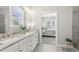 Stylish bathroom with granite countertop and a clear view to the bedroom at 4207 N Carver Dr, Atlanta, GA 30360