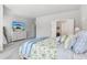 Cozy bedroom with queen bed, dresser, and soft natural lighting at 4207 N Carver Dr, Atlanta, GA 30360