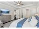 Spacious main bedroom with trey ceiling, fan, and large dresser with a TV at 4207 N Carver Dr, Atlanta, GA 30360