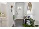 Inviting entryway features dark hardwood floors and a console table with decor at 4207 N Carver Dr, Atlanta, GA 30360