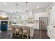Beautiful kitchen with large island, fireplace and stainless steel appliances at 4207 N Carver Dr, Atlanta, GA 30360