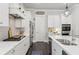 Spacious kitchen with stainless steel appliances, gas range and custom hood vent at 4207 N Carver Dr, Atlanta, GA 30360