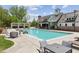 Community pool with outdoor seating, a covered lounge area, and a beautifully designed clubhouse at 4207 N Carver Dr, Atlanta, GA 30360