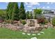 Garden featuring stone wall, garden, and cascading waterfall at 4207 N Carver Dr, Atlanta, GA 30360