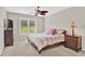 Neutral bedroom with carpet, ceiling fan, and nice furnishings at 5335 Davenport Mnr, Cumming, GA 30041