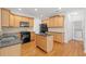 Well-equipped kitchen with granite countertops, stainless steel appliances, and center island at 6131 Windflower Dr, Powder Springs, GA 30127