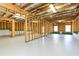 Unfinished basement with concrete floor and framed walls ready for customization at 1215 Elowen Dr, Austell, GA 30168