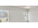 Bright bedroom featuring a trey ceiling, two windows and recessed lighting at 1215 Elowen Dr, Austell, GA 30168