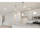 Modern kitchen featuring stainless steel appliances and pendant lighting at 1215 Elowen Dr, Austell, GA 30168