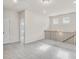 Spacious loft area with plush carpeting, natural light, and a decorative railing at 1215 Elowen Dr, Austell, GA 30168