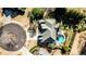 An aerial view shows a house with a manicured yard, circular driveway, backyard pool, and mature trees at 389 Mill Creek Ne Bnd, Atlanta, GA 30307