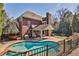 Relaxing backyard featuring a private pool, patio space, and mature landscaping at 389 Mill Creek Ne Bnd, Atlanta, GA 30307
