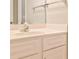 Close-up of bathroom vanity featuring a faucet and solid surface countertops at 389 Mill Creek Ne Bnd, Atlanta, GA 30307