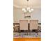 Dining area showcasing a stylish chandelier fixture over a well-appointed dining table at 389 Mill Creek Ne Bnd, Atlanta, GA 30307