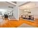 Elegant foyer with hardwood floors, staircase, and views into living and dining areas at 389 Mill Creek Ne Bnd, Atlanta, GA 30307