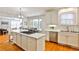Bright kitchen featuring white cabinets, stainless steel appliances, and hardwood flooring at 389 Mill Creek Ne Bnd, Atlanta, GA 30307
