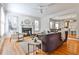 Inviting living room with a fireplace, hardwood floors, and lots of natural light at 389 Mill Creek Ne Bnd, Atlanta, GA 30307