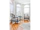Cozy sitting area with hardwood floors, arched windows, and comfortable seating at 389 Mill Creek Ne Bnd, Atlanta, GA 30307