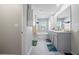 Bright bathroom featuring a double vanity, tub, and shower, creating a relaxing and practical space at 529 Azalea Bloom Dr, Loganville, GA 30052