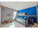 Fun bedroom featuring a bunk bed, desk, and playful decorations, ideal for children at 529 Azalea Bloom Dr, Loganville, GA 30052