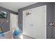 Playful bedroom featuring a closet, basketball hoop, and sports-themed decor, perfect for a space at 529 Azalea Bloom Dr, Loganville, GA 30052