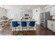 Stylish kitchen with granite countertops, stainless steel appliances, and an island with bar seating at 529 Azalea Bloom Dr, Loganville, GA 30052